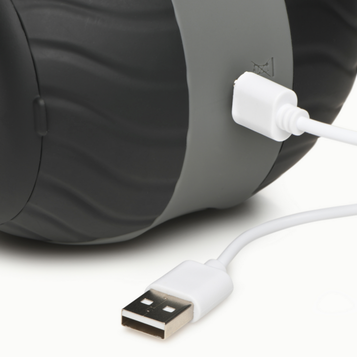 Vibrating and Squeezing Masturbator - 10X - Black